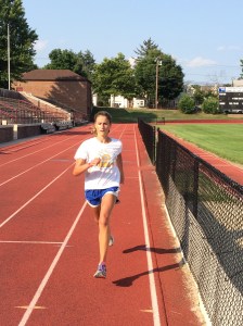 Arms crossing over midline of body.